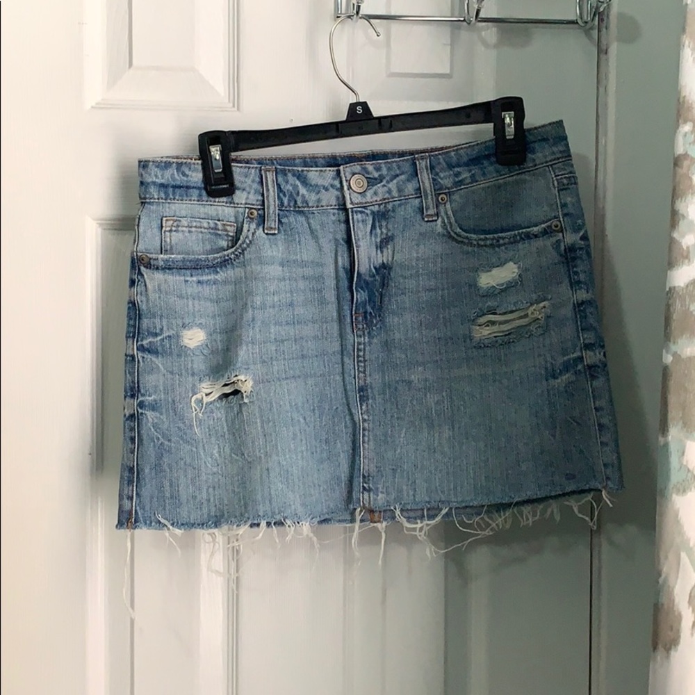 Ripped denim mini skirt